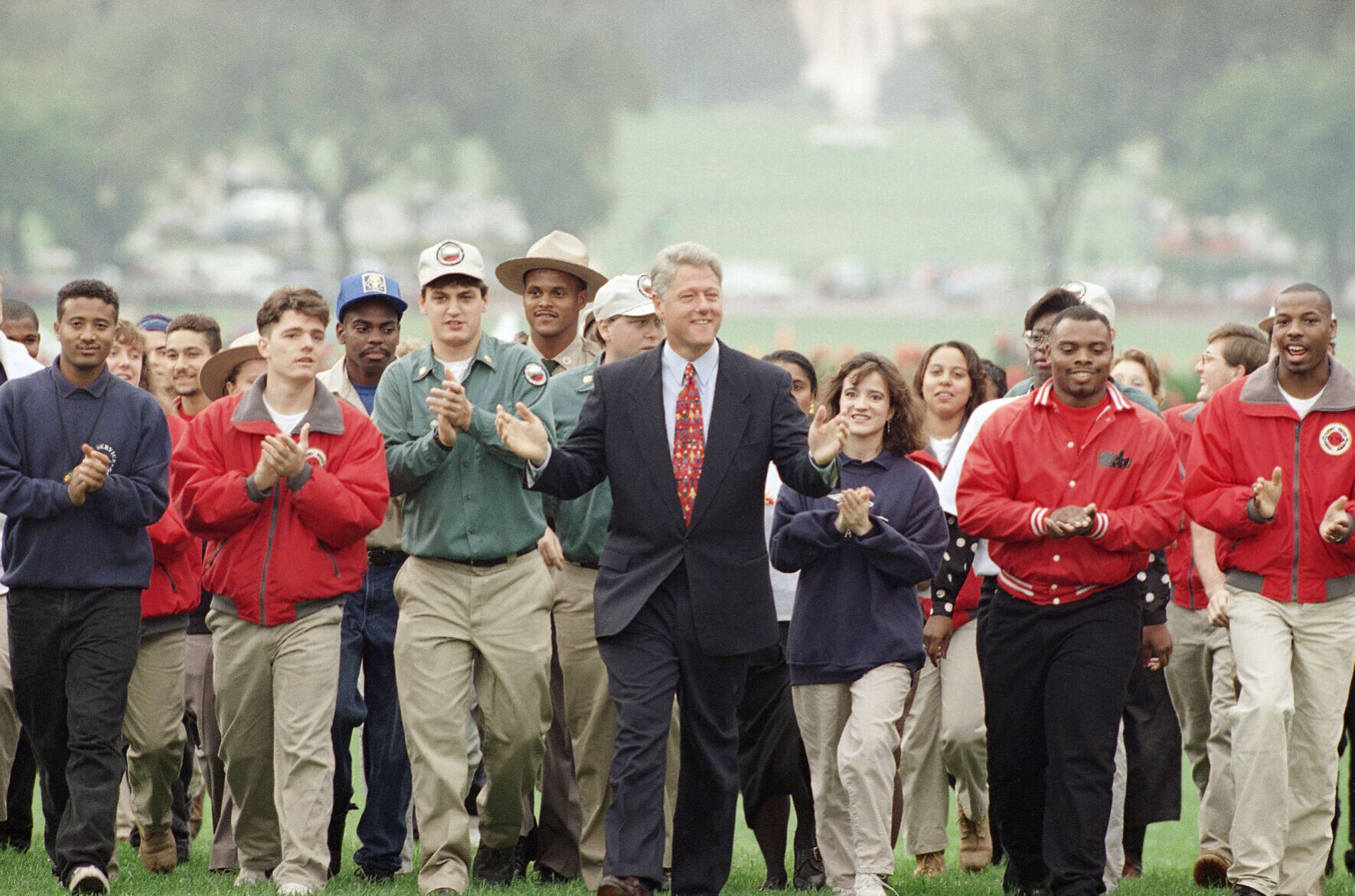 1993: Signs bill creating National Service Program
